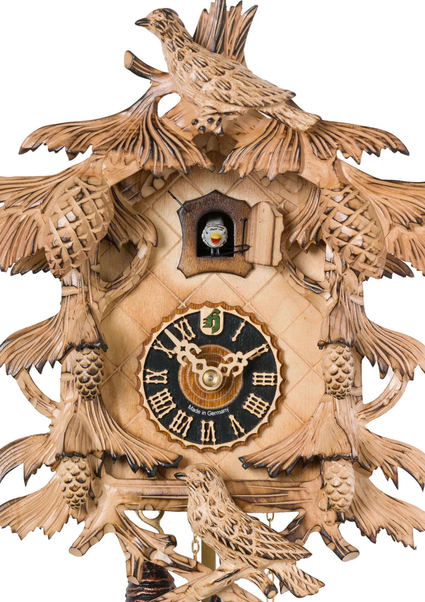 Cuckoo Clock | Natural Color Wood | 1 Day Movement Small mechanical traditional natural color wood black forest cuckoo clock with branches of the pine three and the birds representing the wildlife in the Black Forest