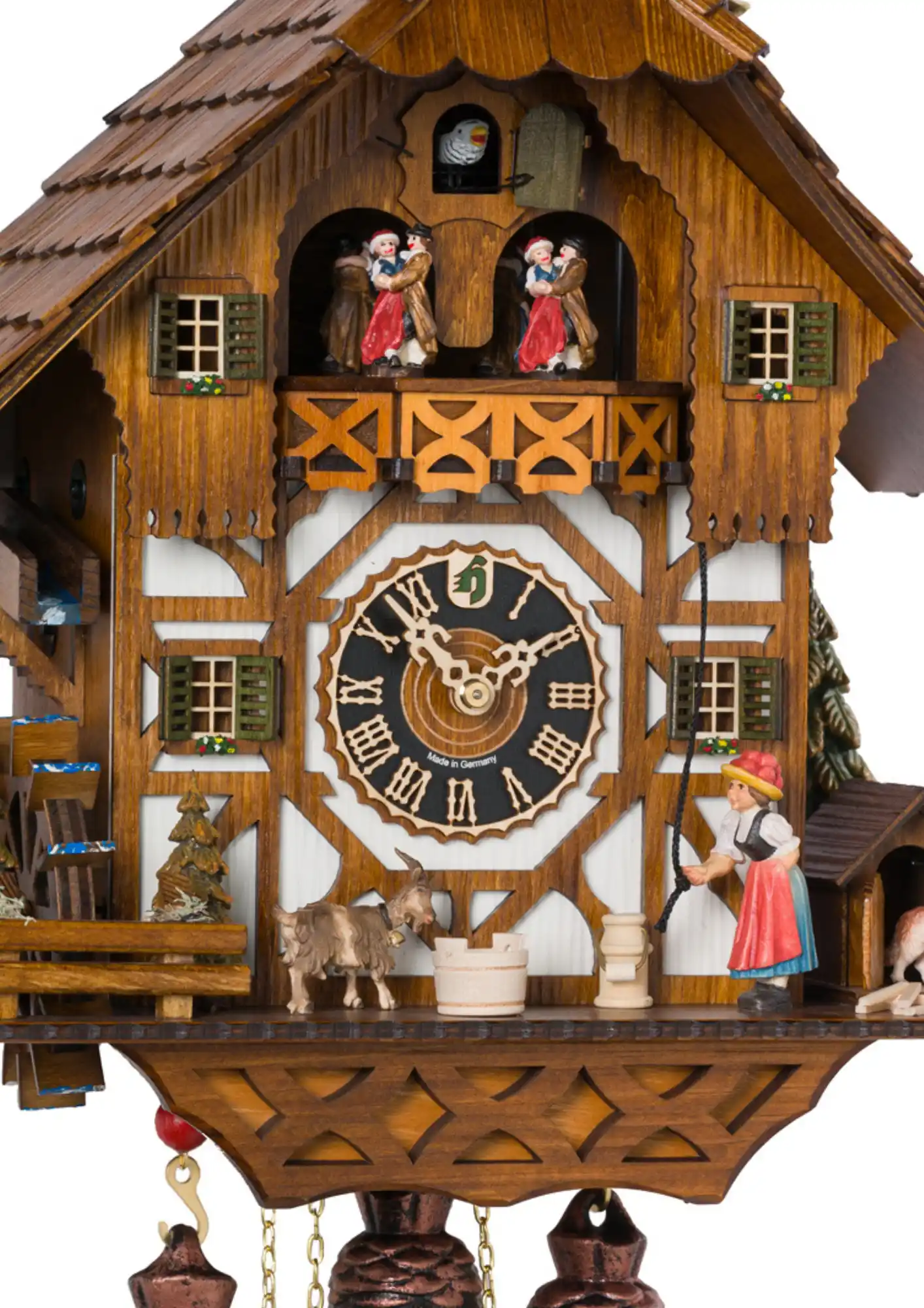 Cuckoo Clock Farmhouse Bell Ringer 8 Day Movement with Music (2) Mechanical 8 day large colorful black forest cuckoo clock shows a Black Forest lady in traditional dress with "bollenhut" ringing a bell, calling her husband home for supper. Dancers dance, water wheel turns and the Black Forest lady is pulling the bell,
