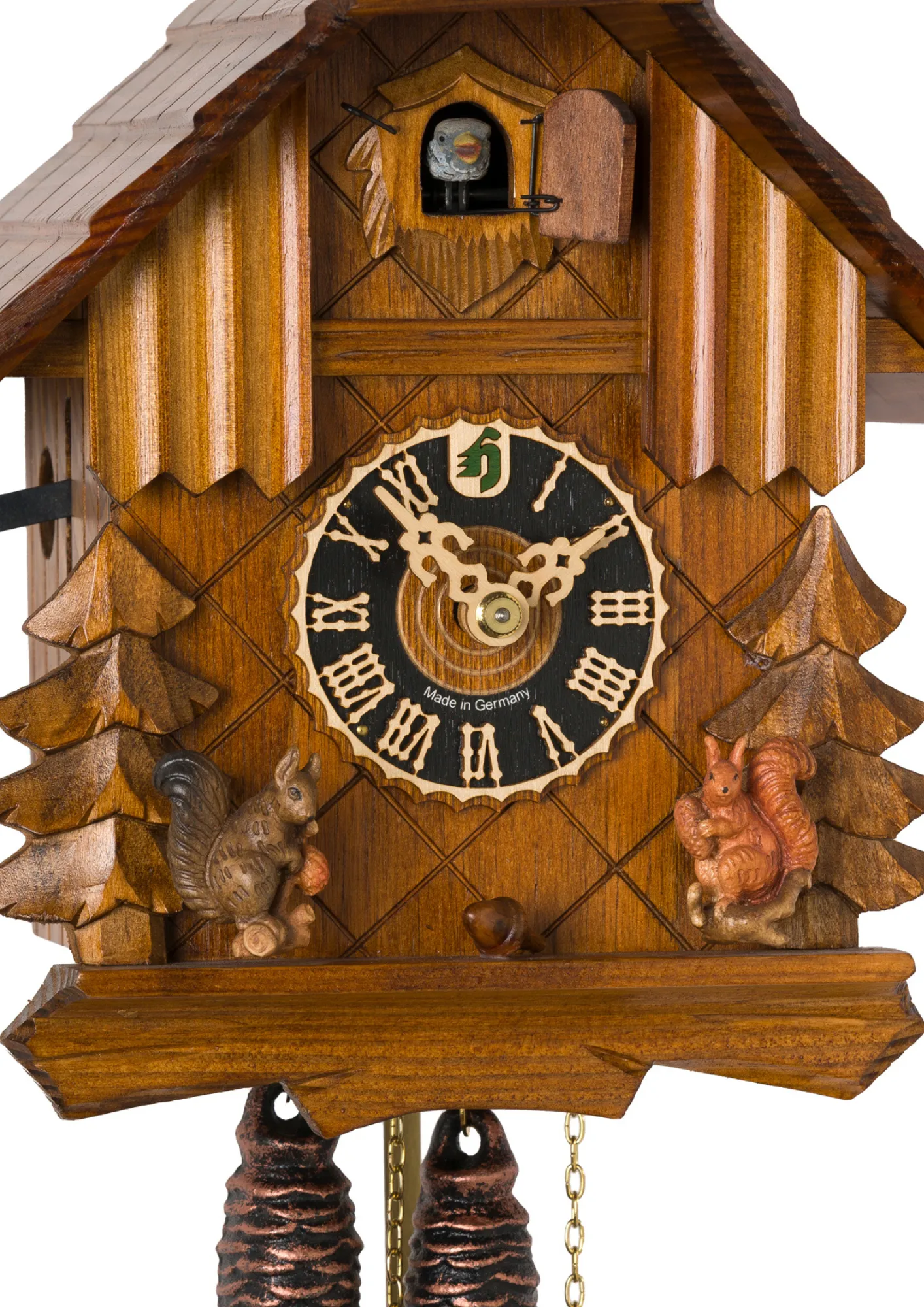 Cuckoo Clock Squirrels on the Hunt 1 Day Movement (2) This adorable little brown mechanical black forest cuckoo clock shows two squirrls scurrying about the forest and the hut, collecting nuts. The squirrels move with the sound of the cuckoo