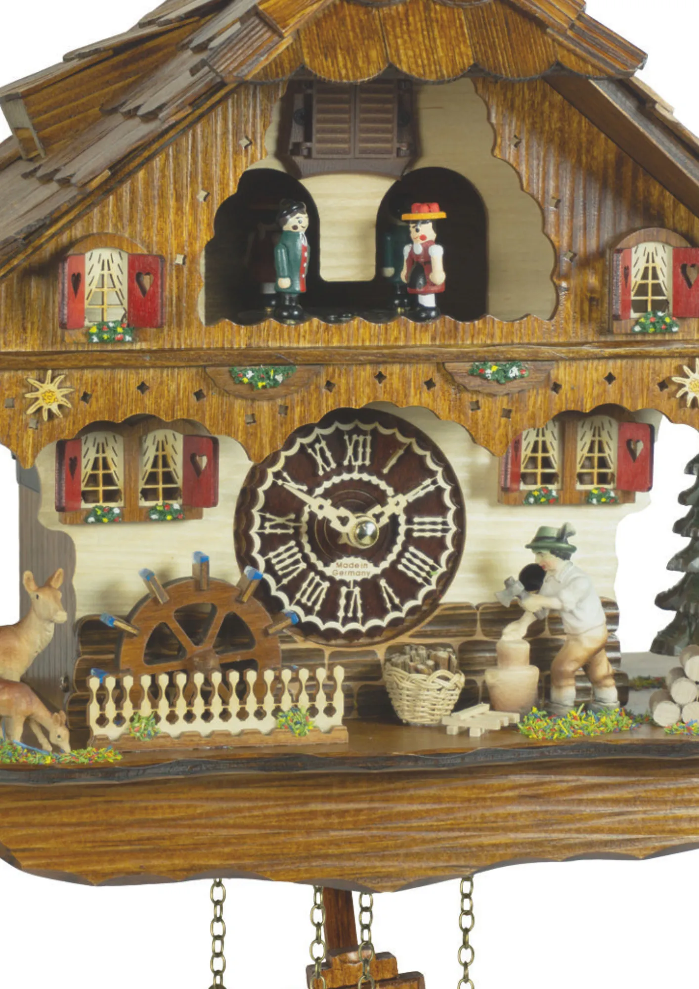 Black forest cuckoo clock in chalet style with wood chopper water wheel dancers and music made by Trenkle Uhren