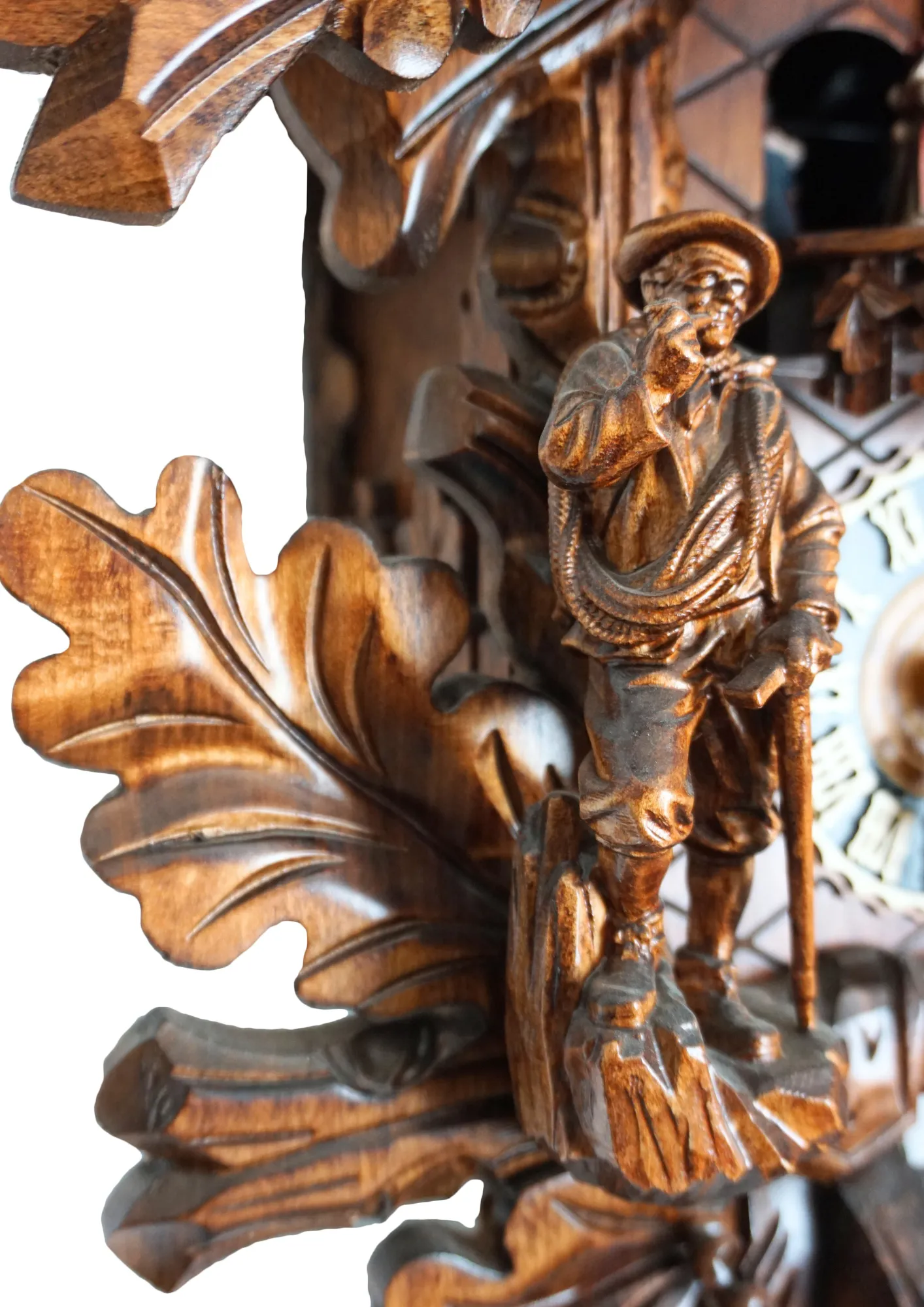 Cuckoo Clock Black Forest Wildlife 8 Day Movement with Music (5) Large authentic traditional style brown mechanical black forest cuckoo clock precisely hand carved to the finest detail. Representing black forest wildlife with an oak leaves decorating the whole clock, deer overlooking the forest on top, ox and the rock