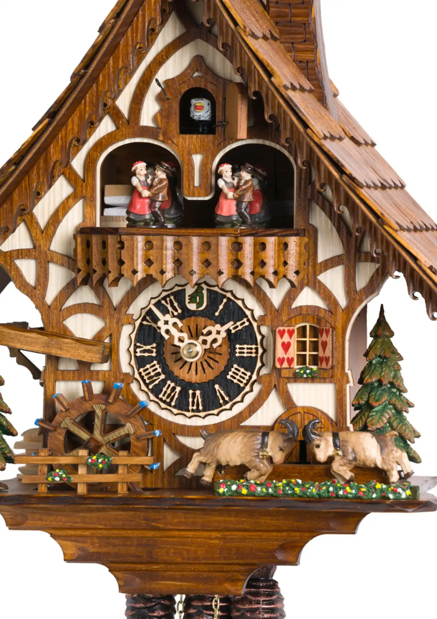 Cuckoo Clock Sparring Goats 1 Day Movement with Music (2) A chalet-style Black Forest cuckoo clock with fine details and two mountain goats sparring in the front. Dancers dance, water wheel turns and the goats are bumping their heads as the music plays. Made by Hönes