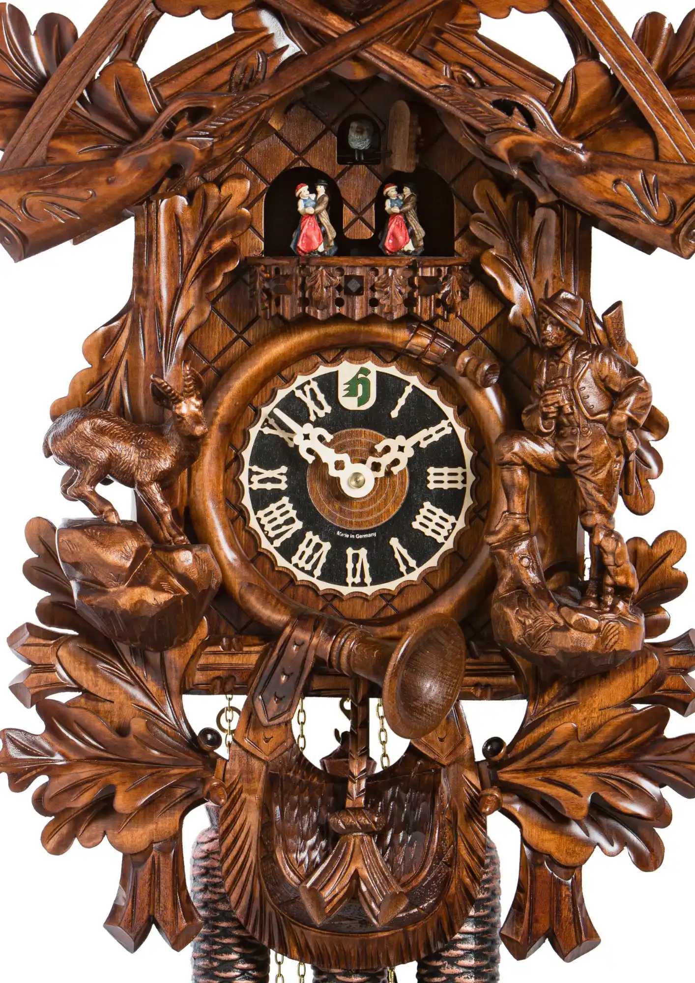 Cuckoo Clock Hunting 8 Day Movement with Music (3) This detailed mechanical authentic hunting clock is hand carved to the finest detail, shwoing a hunter staring down a Black Forest hare, bouncing in this direction. Most noticable details are hunters gun, his dog and the binoculars as well as the hounting