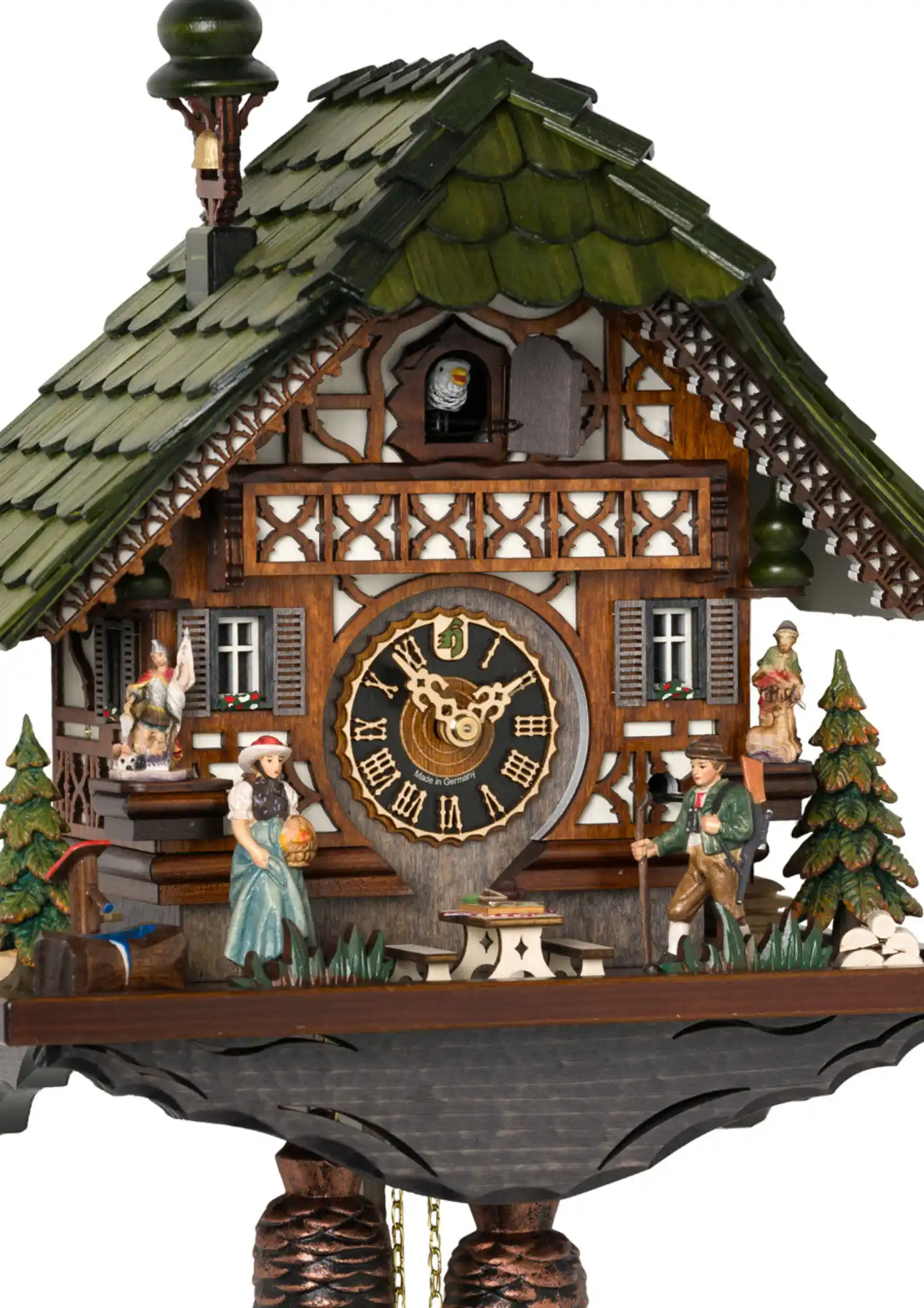 Cuckoo Clock Deep in the Forest 8 Day Movement (2) This mechanical brown cuckoo clock shows a couple living in their forest house. The Black Forest lady says goodbye for the day to her husband, who is leaving for his haunting round. With every cuckoo chime the hunter moves his stick as he is walking.