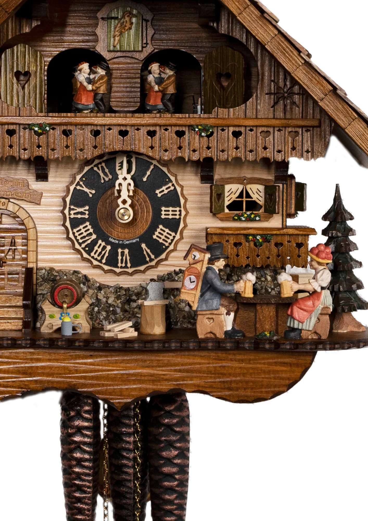 Cuckoo Clock Hofgut Sternen 1 Day Movement with Music (3) Lovely black forest mechanical cuckoo clock with a beer a black forest lady in tradtional dress together with cuckoo clock salesman drinking a beer in front of the chalet house that carries our name Hofgut Sternen. As the music plays they hit beer steins