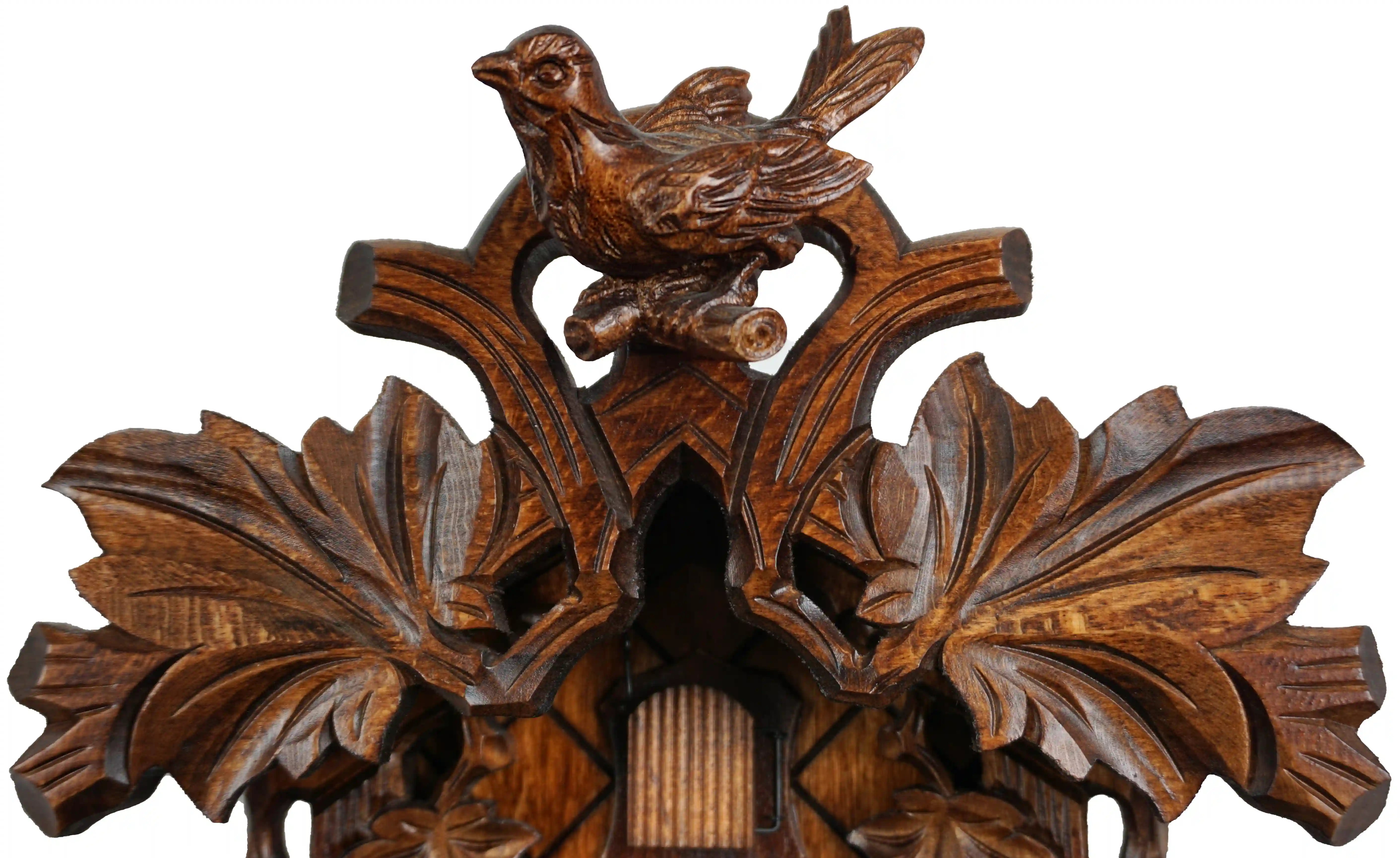 Hand carved traditional mechanical brown black forest cuckoo clock with squirrels and cuckoo bird carvings made by Hönes