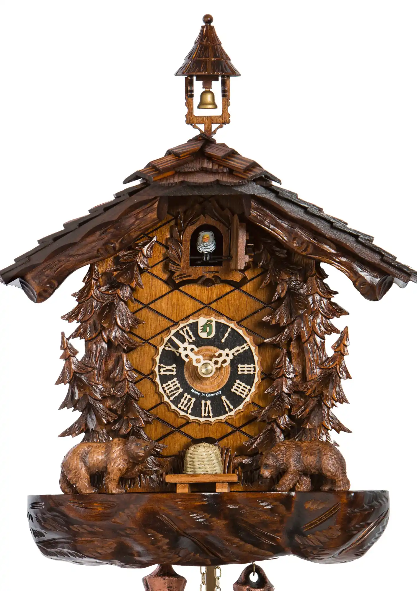 Cuckoo Clock Bears and the Beehive 8 Day Movement (2) This Black Forest mechanical medium size authentic cuckoo clock shows two bears searching for a snack and creeping up on a beehive. Hand carved pine threes, tower bell and the shingle roof really give this cuckoo clock a special apperance.