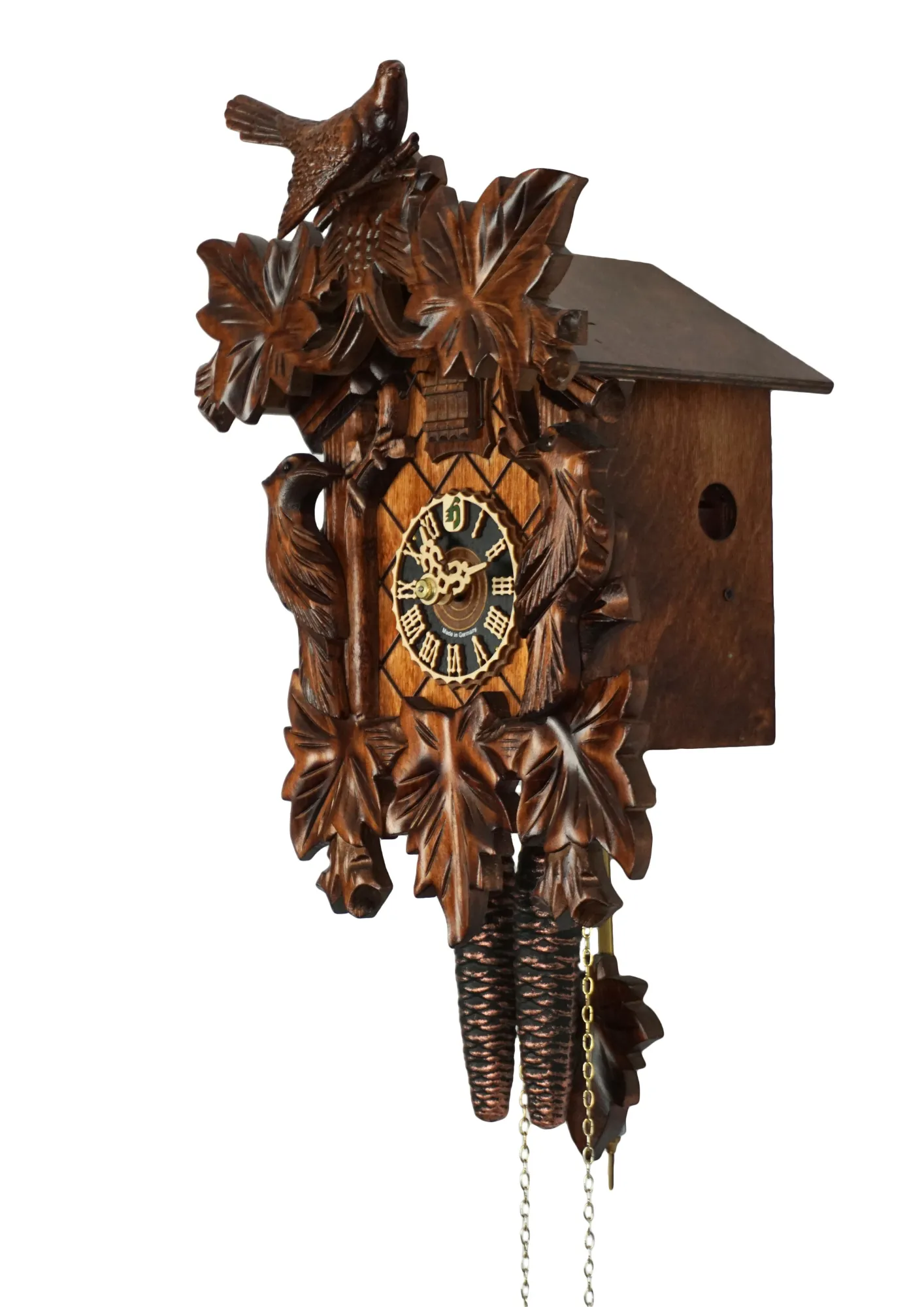 Authentic brown mechanical black forest cuckoo clock with wood peckers, one day clockwork, made by Hönes