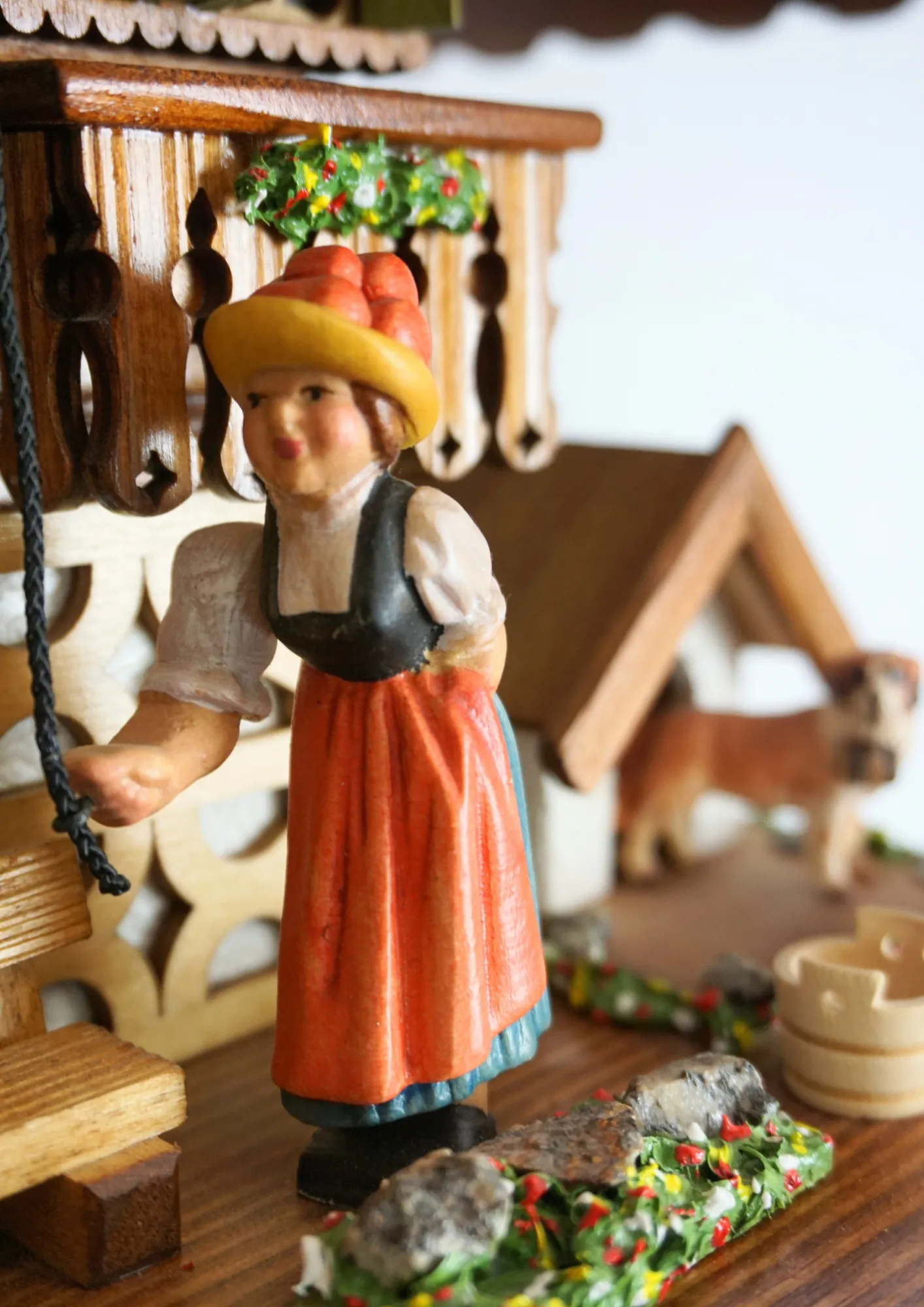 Cuckoo Clock Wood Chopper and Bell Ringer 8 Day Movement with Music (3) This very detailed black forest mechanical 8 day cuckoo clock shows a wood chopper and a bell ringer, both hand-painted and hand-carved figurines. A typical Black Forest house with people wearing traditional Black Forest clothing is a must-have motif of t