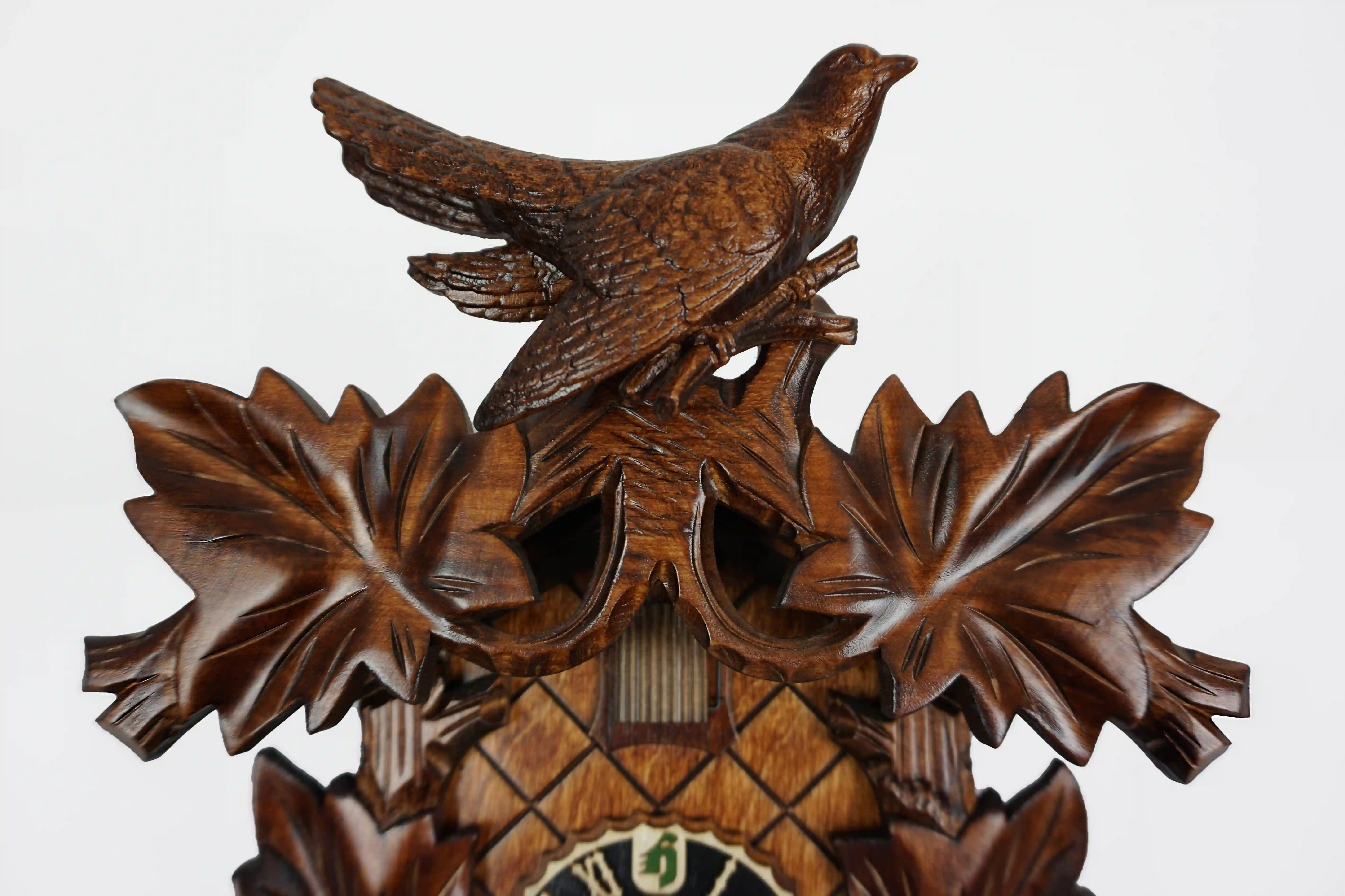 Cuckoo Clock Traditional, Bird on Top 8 Day Movement (4) Traditional brown mechanical black forest cuckoo clock decorated with wine leave and very precisely carved cuckoo bird, made by Hönes